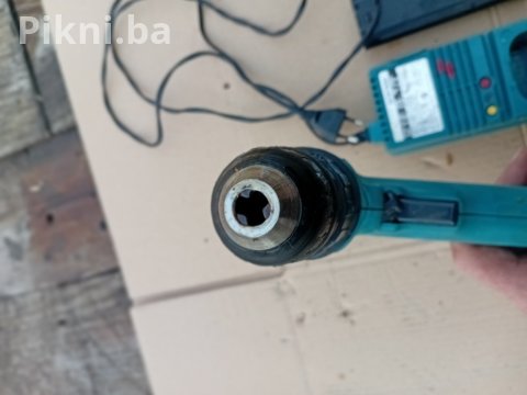 SNIŽENO! Makita 9.6V Aku Bušilica 6096D + Punjač DC9700H (Punjač 8