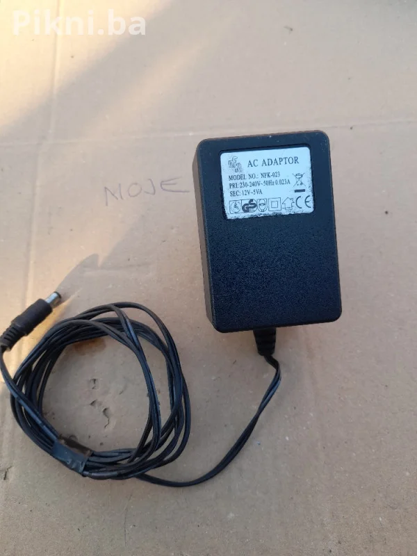 AC/AC ADAPTER 12V ~ 5VA (model NFK-023) prtevarač ispravljač punjač