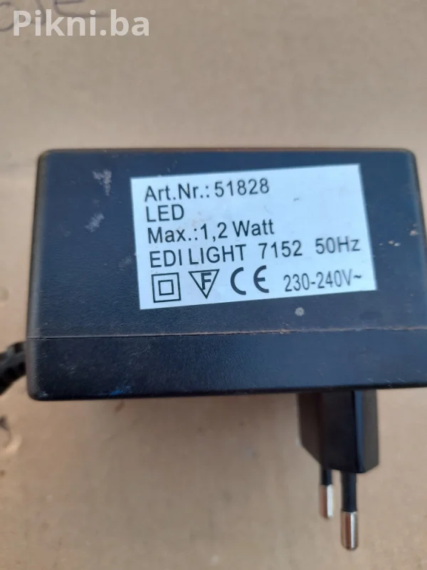 AC/AC ADAPTER 12V ~ 5VA (model NFK-023) prtevarač ispravljač punjač